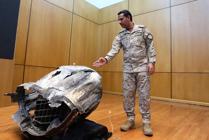 Saudi-led coalition spokesman, Colonel Turki al-Malki, displays the debris of a ballistic missile which he says was launched by Yemen's Houthi group towards the capital Riyadh, during a news conference in Riyadh, Saudi Arabia March 29, 2020. REUTERS/Ahmed Yosri