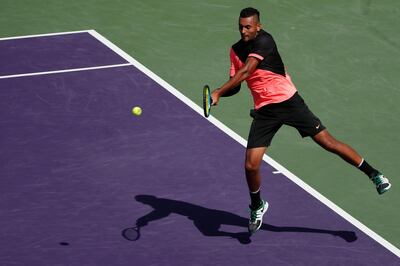 Mar 26, 2018; Key Biscayne, FL, USA; Nick Kyrgios of Australia hits a backhand against Fabio Fognini of Italy (not pictured) on day seven of the Miami Open at Tennis Center at Crandon Park. Kyrgios won 6-3, 6-3. Mandatory Credit: Geoff Burke-USA TODAY Sports