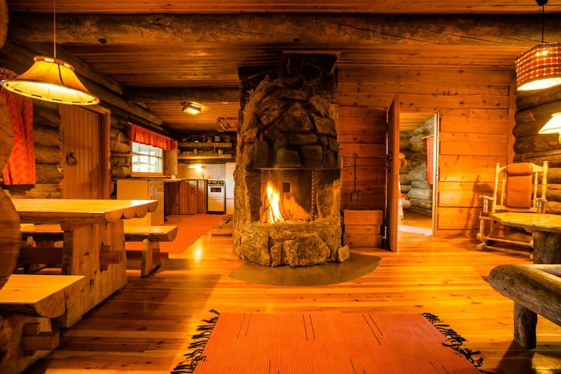 A shot of the living room of the log cabin at Kakslauttanen East Village. Courtesy Kakslauttanen Arctic Resort