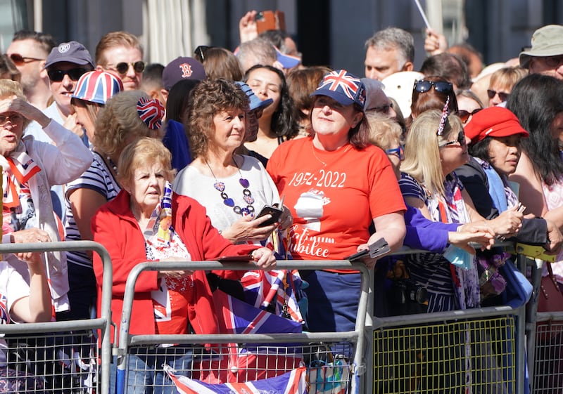 Well-wishers wait for the arrival of the royal family outside St Paul's Cathedral. Getty Images