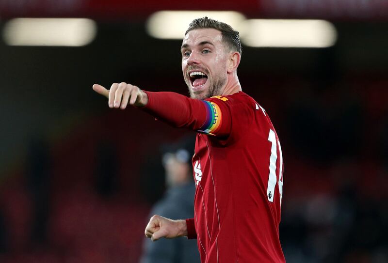 Liverpool's Jordan Henderson celebrates after the final whistle. PA