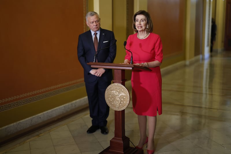 Ms Pelosi speaks at a press conference alongside King Abdullah at the US Capitol. Bloomberg