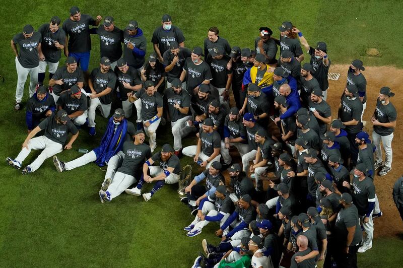 Los Angeles Dodgers pose for a group picture after defeating the Tampa Bay Rays 3-1. AP