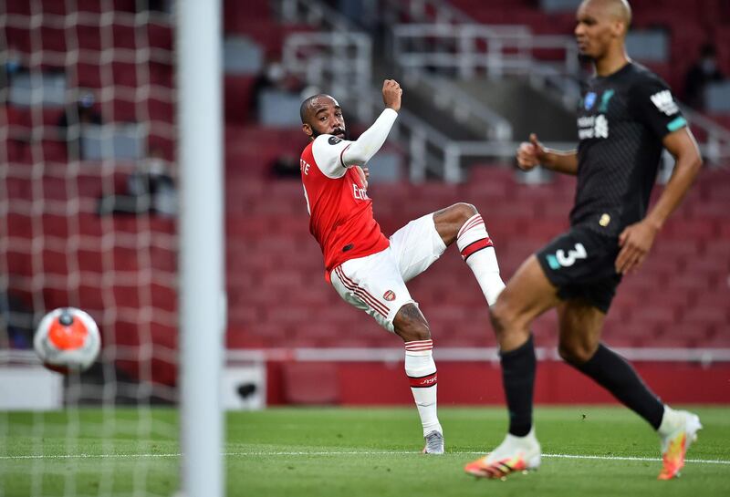 Alexandre Lacazette - 8: Tigerish in defence and an assassin in attack. The Frenchman's quick-thinking and finishing are the reasons Arsenal beat the champions. AFP