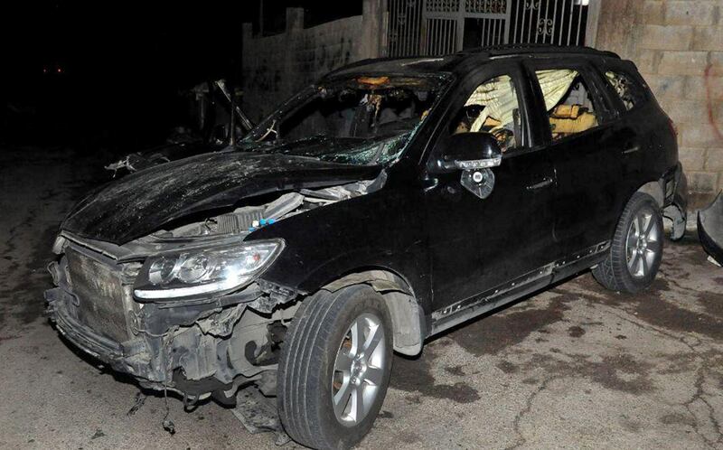A photo released by the Syrian state news agency shows Adnan Al Afyouni's damaged car after a bombing that killed him in the town of Qudsaya on October 22, 2020. Sana via Reuters