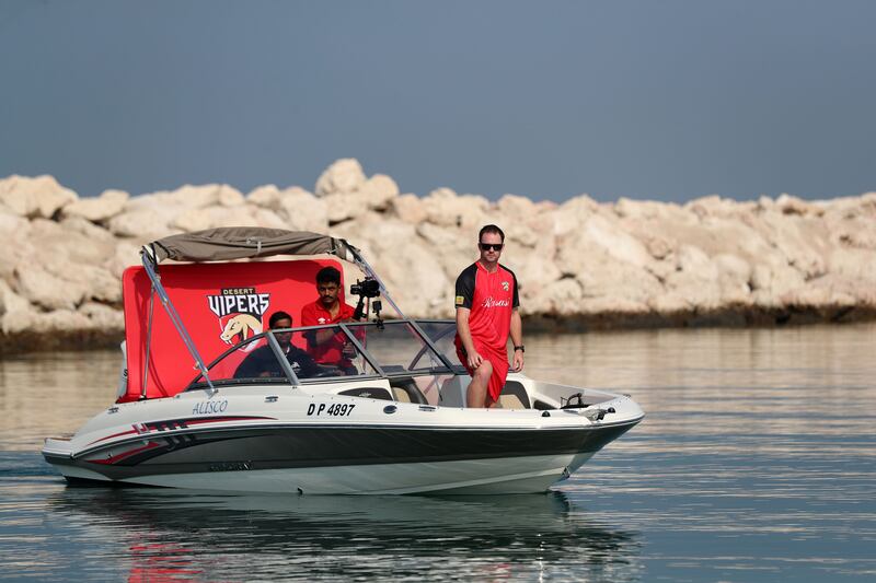 Captain Colin Munro arrives by boat. 