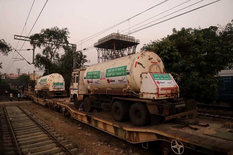 Medical oxygen tankers are delivered via the ‘Oxygen Express’ train to a Delhi railway station. Bloomberg