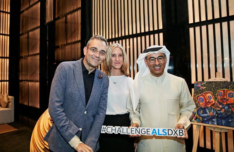 Peter Van Wyk, a senior director at Emaar, pictured with the company's chairman Mohamed Alabbar at a charity art auction. Peter was diagnosed with ALS, a form of motor neuron disease. 
Emaar has been raising funds for the condition and donating them to Al Jalila Foundation.
The auction raised a total of US$87,725 (over AED 322,000). Emaar doubled the funds to a total of US$175,450 (over AED 644,000). All proceeds from ticket sales for the event will also be contributed to Al Jalila Foundation.