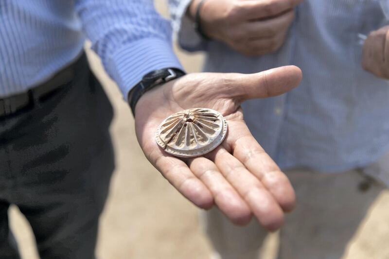 FUJAIRAH, UNITED ARAB EMIRATES - MARCH 01, 2018.

An ornamental object found at an ancient burial site that has been uncovered in Dibba Al Fujairah and is being excavated by a team of German archeologists and a team from Fujairah Tourism and Antiquities Authority.

(Photo: Reem Mohammed/ The National)

Reporter: John Dennehy
Section: NA