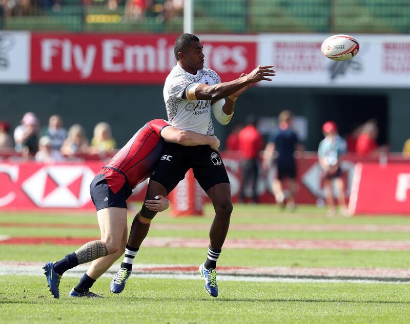 Dubai, United Arab Emirates - December 1st, 2017: Apisai Domolailai of Fiji is tackled during the game between Fiji and Russia at the 2nd Day of Dubai Rugby 7's. Friday, December 1st, 2017 at The Sevens, Dubai. Chris Whiteoak / The National