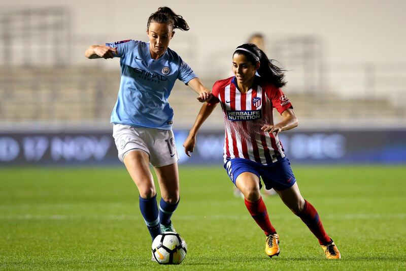 MANCHESTER, ENGLAND - SEPTEMBER 26:  Caroline Weir of Manchester City Women battles for possession with Kenti Robles of Atletico de Madrid during the Womens UEFA Champions League 2nd Leg match between Manchester City Women and Atletico Madrid Femenino at Manchester City Football Academy on September 26, 2018 in Manchester, England.  (Photo by Alex Livesey/Getty Images)