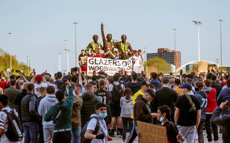 Manchester United fans during a protest against the club owners outside Old Trafford. PA