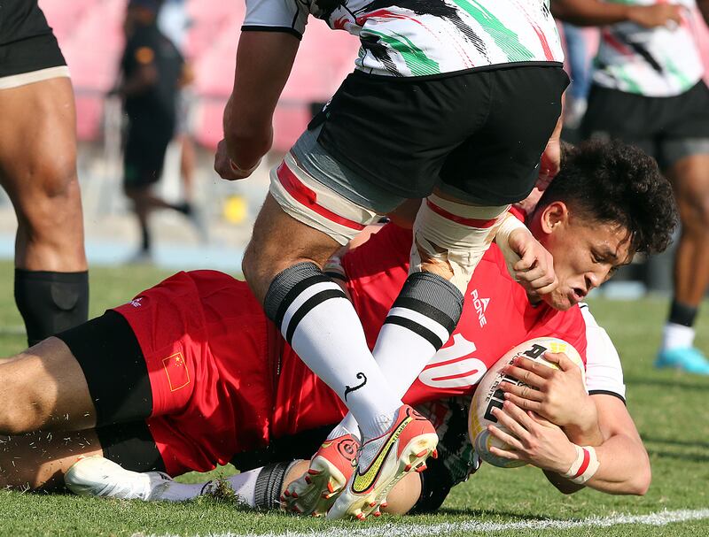 China' Luda Lius in action during the national team's 29-17 win against UAE  in the Dialog Asia Rugby Sevens Series at Rugby Park in Dubai Sports City.