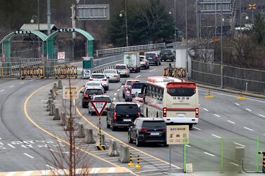Vehicles carrying South Korean officials of the inter-Korean liaison office head to North Korea's border city of Kaesong at a border checkpoint, just south of the Demilitarized zone dividing the two Koreas, in Paju on March 25, 2019. AFP