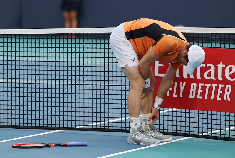 Andy Murray hurting his ankle during the defeat to Tomas Machac at the Miami Open. AFP