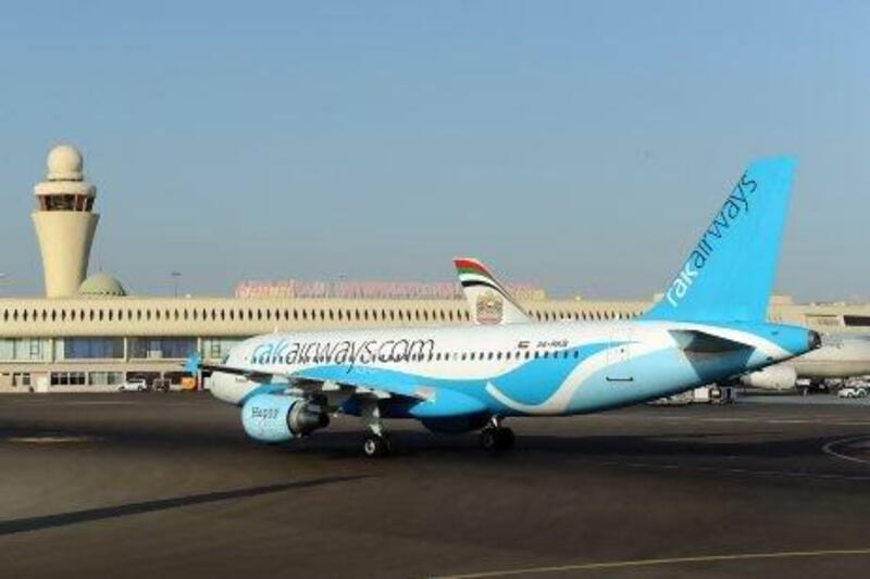 The inaugural flight of RAK Airways from Ras Al Khaimah lands at Abu Dhabi International Airport in October. Courtesy Adac