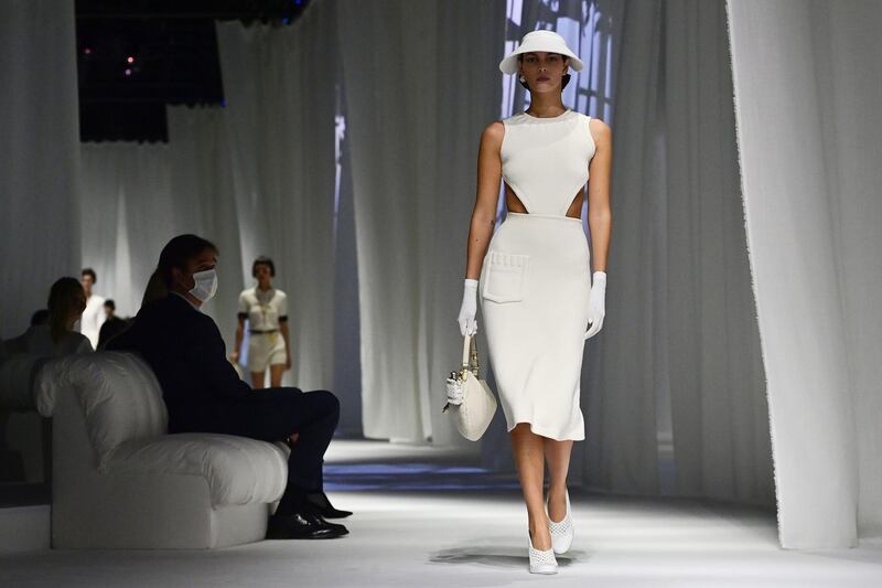 A model presents a creation by Fendi's Spring/Summer 2021 women's and men's collection during the Milan Fashion Week. AFP