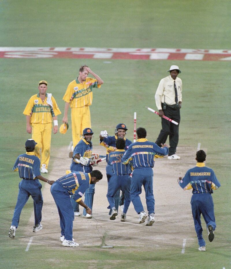 LAHORE, PAKISTAN - MARCH 17:  Sri Lanka captain Arunja Ranatunga (c) celebrates with fellow batsman Aravinda De Silva and team mates whilst Shane Warne (l) and Glen McGrath react as umpire Steve Bucknor looks on after the 1996 Cricket World Cup Final between Australia and Sri Lanka played at the Gaddafi stadium on March 17, 1996 in Lahore, Pakistan.  (Photo by Allsport/Getty Images)