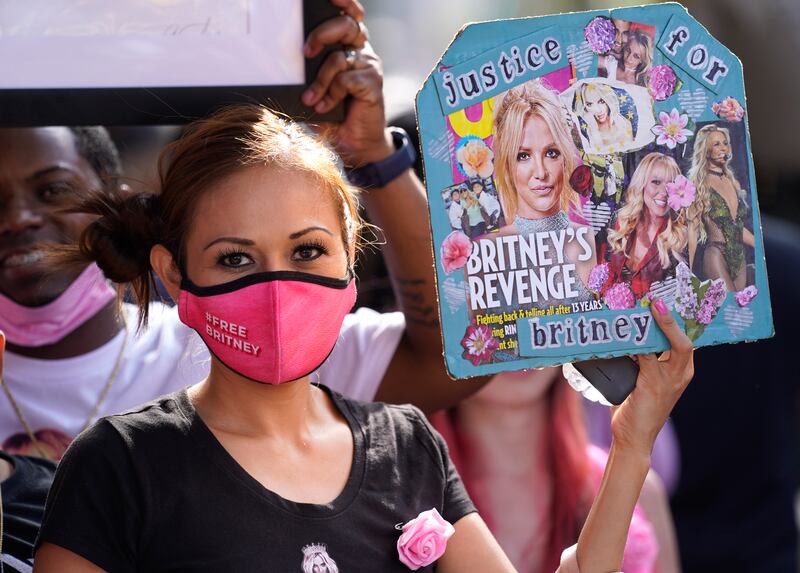 Britney Spears supporter Kiki Norberto of Phoenix celebrates outside the Stanley Mosk Courthouse in Los Angeles, California. AP