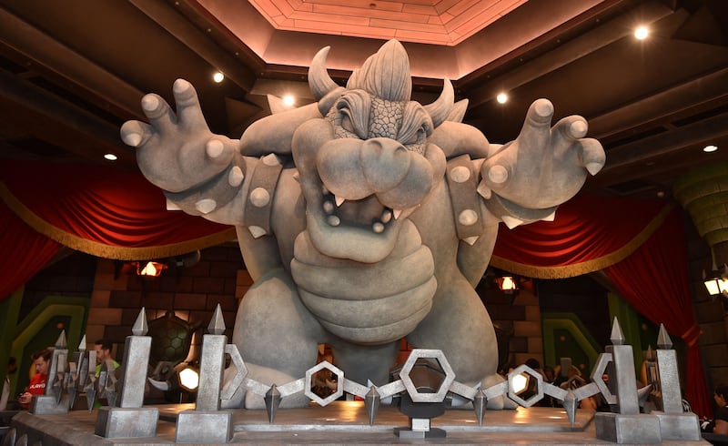 Bowser at the entrance of the Mario Kart Bowser's Challenge ride