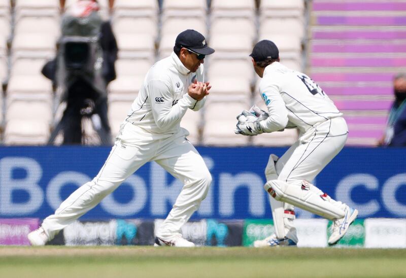New Zealand's Ross Taylor takes a catch to dismiss India's Ravichandran Ashwin off the bowling of Trent Boult. Reuters