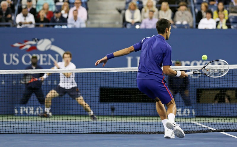 Serbia's Novak Djokovic returns a shot to Britain's Andy Murray during the championship match at the 2012 US Open tennis tournament,  Monday, Sept. 10, 2012, in New York. (AP Photo/Charles Krupa) *** Local Caption ***  US Open Tennis.JPEG-0d7bf.jpg