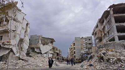 TOPSHOT - This picture taken on March 14, 2019, shows destructions following an airstrike in the jihadist-held city of Idlib, northwestern Syria. Russian air strikes killed at least 13 civilians, including six children, on March 14 in Idlib province, in the first such raids since a September truce deal, a monitor said. The Britain-based Syrian Observatory for Human Rights said around 60 people were also wounded in the air strikes that struck several areas in the northwestern province, which is Syria's last major rebel bastion. / AFP / Muhammad HAJ KADOUR
