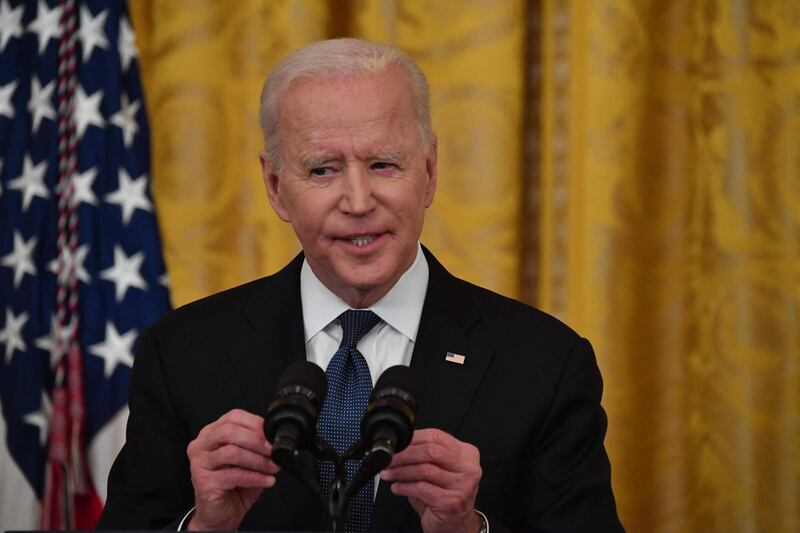 US President Joe Biden speaks before signing the Covid-19 Hate Crimes Act, in the East Room of the White House in Washington, DC on May 20, 2021.  / AFP / Nicholas Kamm
