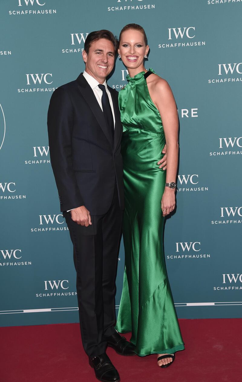 Husband and wife team Archie Drury and Karolina Kurkova: the model wears a green satin dress by Saloni.