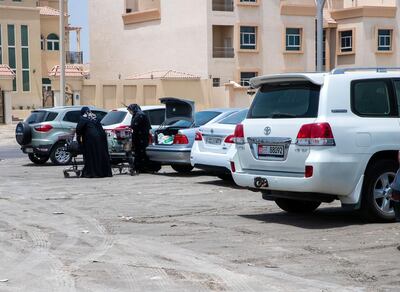 Abu Dhabi, U.A.E., August 16 , 2018. Sand parking lot beside the Khalifa City  Post Office.
Section:  NA
Reporter:  Victor Besa / The National
Section:  NA
Reporter:
