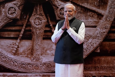 A greeting from Indian Prime Minister Narendra Modi as he waits on the leaders of the G20 countries, in New Delhi, India, on September  9, 2023. AP