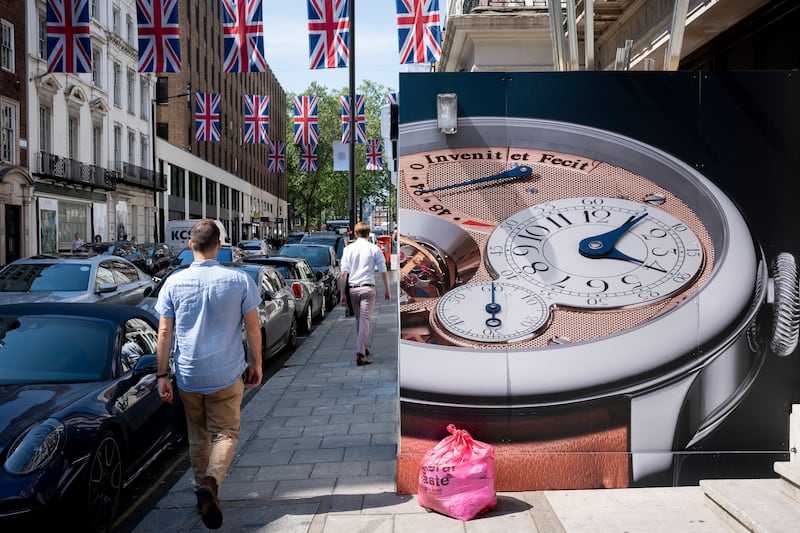A luxury watch advert on the streets in Mayfair, where thieves are ripping such items from people's wrists. Getty Images