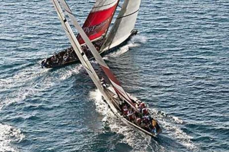 Artemis and Emirates Team New Zealand slug it out in the water.