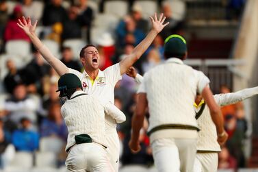 Josh Hazlewood celebrates taking the wicket of Craig Overton, which secured victory for Australia at Old Trafford. Reuters