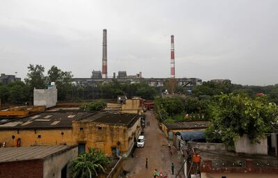 Chimneys of a coal-fired power plant are pictured in New Delhi, India. Reuters