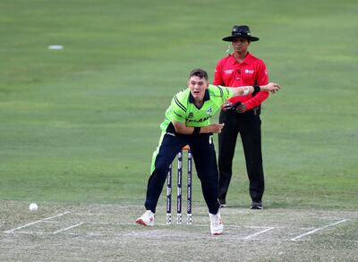 Dubai, United Arab Emirates - October 14, 2019: Ireland's Gareth Delany bowls during the ICC Mens T20 World cup qualifier warm up game between the Ireland and The Netherlands. Monday the 14th of October 2019. International Cricket Stadium, Dubai. Chris Whiteoak / The National