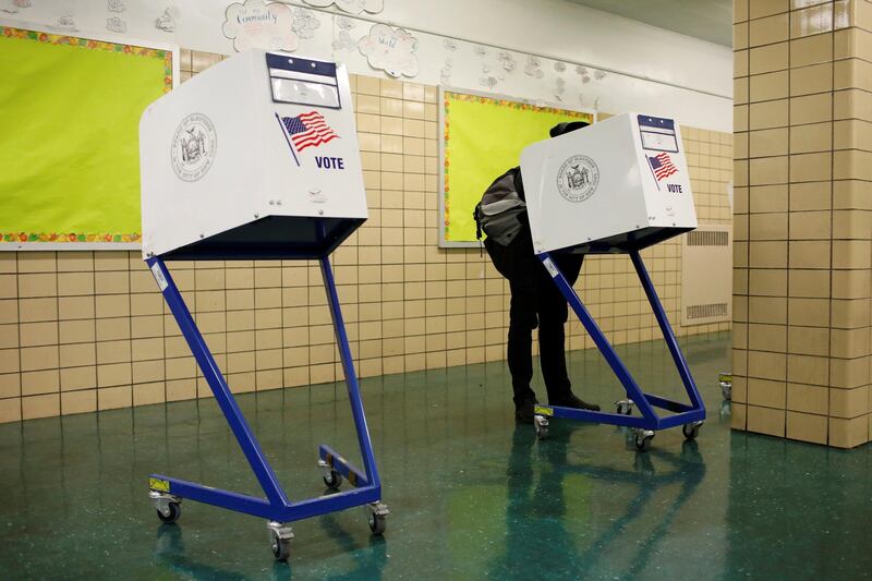 A person votes during the midterm election at PS 140 in Manhattan, New York City. Reuters