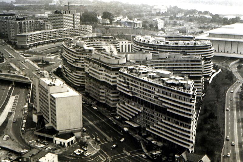 A break-in by five men looking to install microphones at the Watergate and take pictures of documents to find compromising information on Nixon's opponents led to the president's downfall. AFP