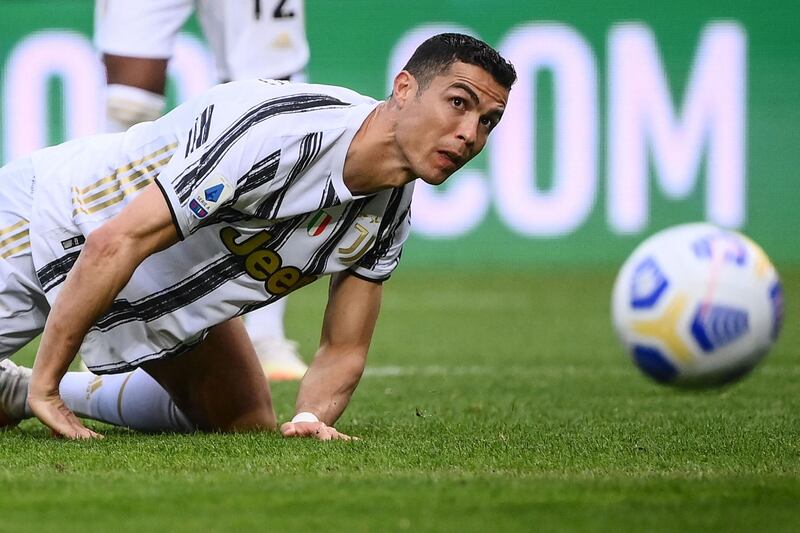 Juventus forward Cristiano Ronaldo is tackled during the Serie A match against Torino at the Olympic Stadium in Turin. AFP