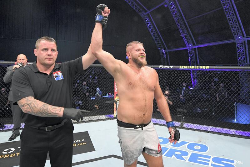 ABU DHABI, UNITED ARAB EMIRATES - OCTOBER 11:  Marcin Tybura of Poland celebrates his victory over Ben Rothwell in their heavyweight bout during the UFC Fight Night event inside Flash Forum on UFC Fight Island on October 11, 2020 in Abu Dhabi, United Arab Emirates. (Photo by Josh Hedges/Zuffa LLC via Getty Images)