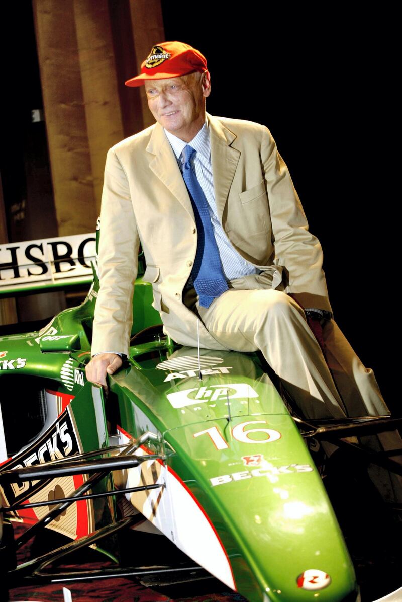 26 Feb 2002:  Niki Lauda of Jaguar Racing poses with their 2002 F1 car during a photo call before a Jaguar F1/HSBC launch held at the ANA Hotel, Sydney, Australia. DIGITAL IMAGE. Mandatory Credit: Nick Wilson/Getty Images