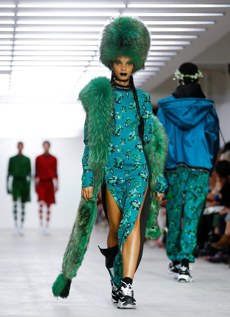 Bobby Abley green furry hat seen at London Fashion Week took clear inspiration from the Queen's Guard. Reuters