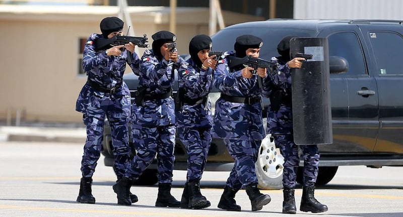 The officers display their new skills at the graduation. Courtesy RAK Police