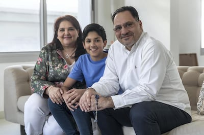 DUBAI, UNITED ARAB EMIRATES. 13 MAY 2020. Eid Feature. Aliya Khan, husband Yasser and son Rakaan at their home in Falcon City. (Photo: Antonie Robertson/The National) Journalist: Keith J Fernandez. Section: National.