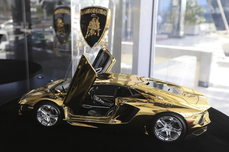 The gold-plated and diamond studded prototype of the Aventador is the most expensive model artist Robert Gulpen has ever made. Sarah Dea / The National