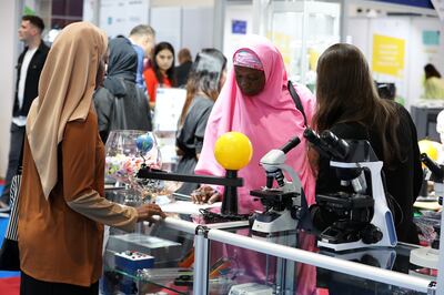 Visitors check educational material at the Global Educational Supplies & Solutions Dubai held at the World Trade Centre. Pawan Singh / The National