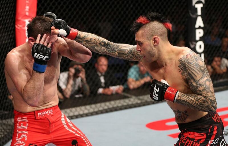 Top: Dan Hardy, right, again Amir Sadollah in Nottingham, England in 2012. The Englishman launched a scathing attack on the US health-care system, who he claims are trying to make him undergo unnecessary surgery for Wolff-Parkinson-White syndrome, a heart disorder where the presence of an extra, abnormal electrical pathway in the heart can lead to periods of accelerated heart beat, before they give him a licence to compete in UFC again. Below: ‘The Outlaw’ will be part of the commentary team at Yas Island on Friday. Josh Hedges / Getty Images

