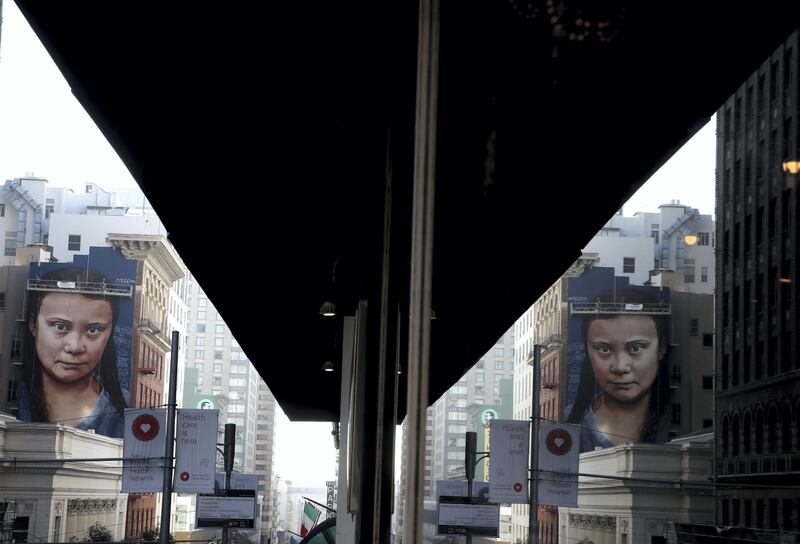 SAN FRANCISCO, CALIFORNIA - NOVEMBER 11: A view of a new four-story-high mural of Swedish climate activist Greta Thunberg on November 11, 2019 in San Francisco, California. A new mural honoring 16 year-old Swedish climate activist Greta Thunberg is nearing completion on the side of a building near San Francisco's Union Square. The mural was designed by Andrés Petreselli and funded by non-profit group OneAtmosphere.org.   Justin Sullivan/Getty Images/AFP