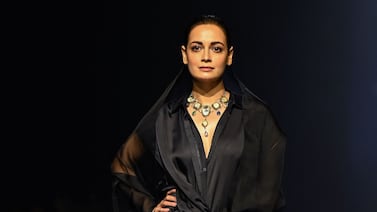 Bollywood actress Dia Mirza presents a creation by designer Amit Hansraj and his Inca label during the second day of the Lakme Fashion Week. AFP
