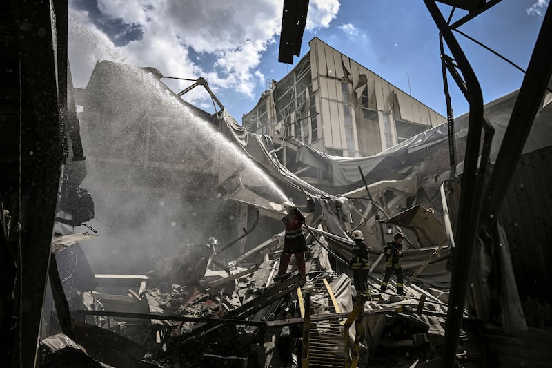 Firemen extinguish a blaze at a Gypsum plant in Bakhmut in the eastern Ukrainian region of Donbas. AFP
